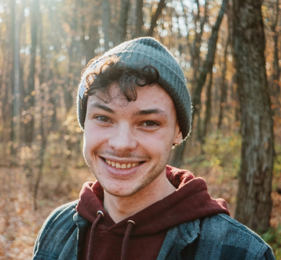 Smiling man in forest