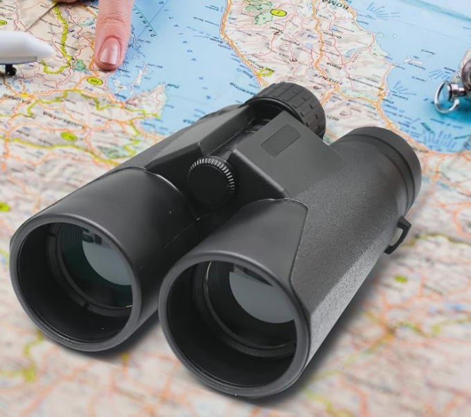 Binoculars on travel map